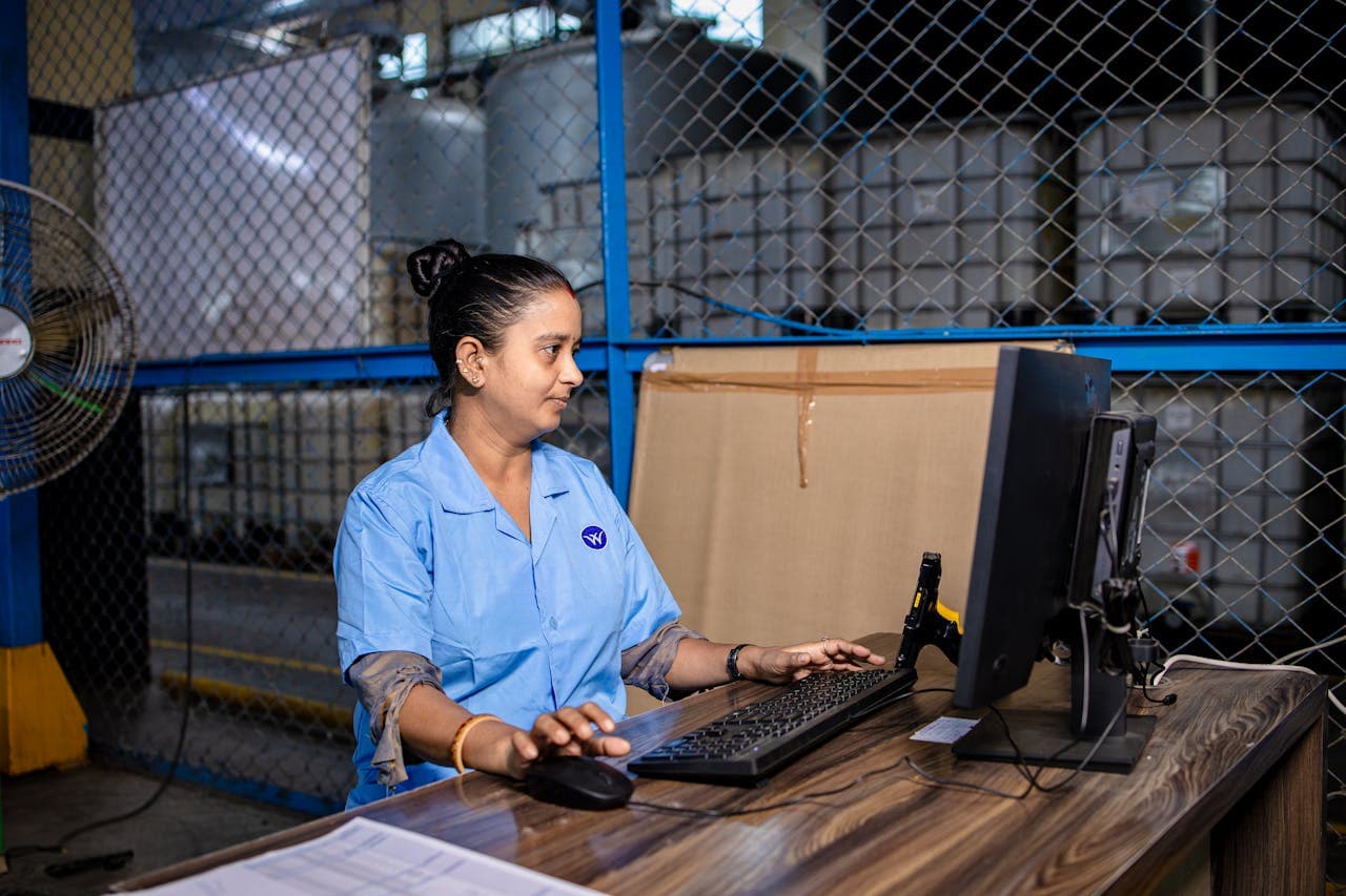 Warehouse worker at computer